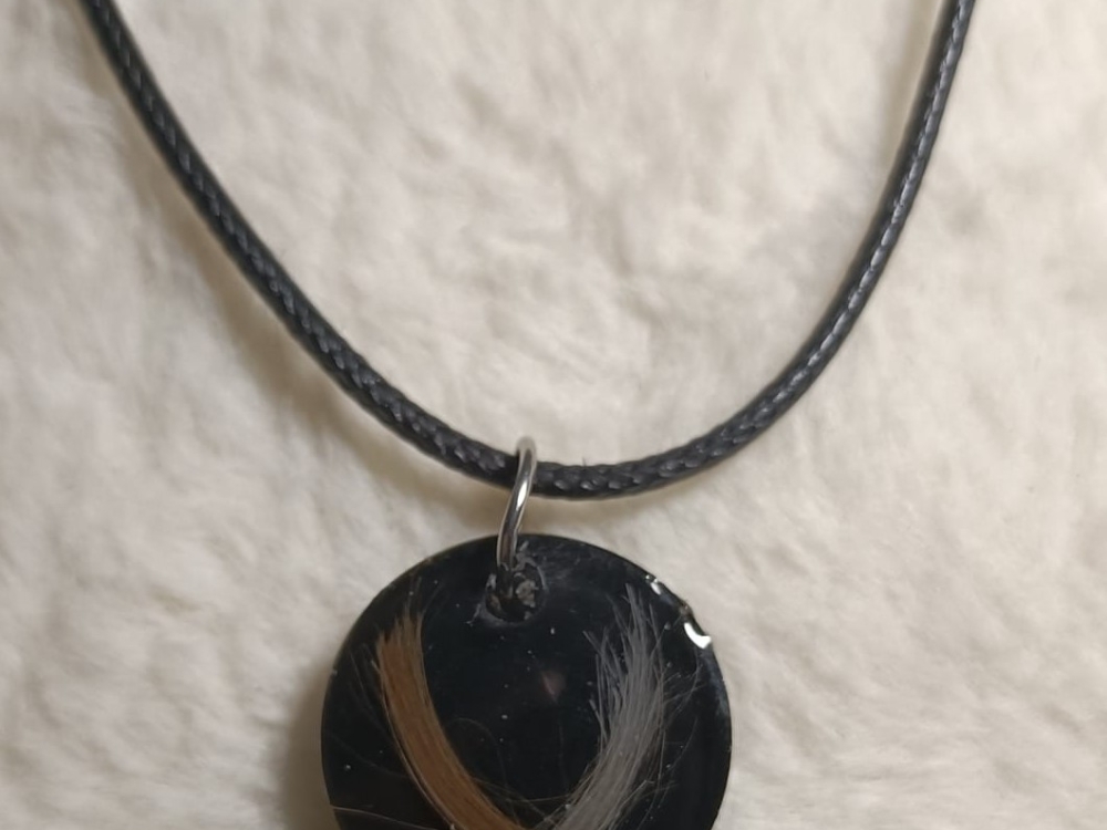 Ketting met vacht of veer